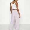 NA-KD X ZALANDO EXCLUSIVE - SPORTY FABRIC PANTS - Pantalon De Survêtement - Lilac -NA-KD Soldes Magasin 014a17071ee24968a332b7254b721d4c