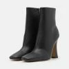 NA-KD FLARED BOOTS - Bottines à Talons Hauts - Black -NA-KD Soldes Magasin 28781da754f14b95898e2af9a36a211b