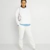 NA-KD LOGO BASIC - Pantalon De Survêtement - Pale Beige -NA-KD Soldes Magasin 3ec2d9c57a7f4877b321e7a382abc6a3