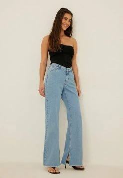 NA-KD SEITLICH GESCHLITZTE MIT UNGENÄHTEM SAUM - Jean Flare - Mid Blue