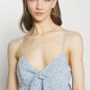 NA-KD PAMELA REIF X ZALANDO FRONT TIE FRILL - Débardeur - Blue -NA-KD Soldes Magasin 51bc8667c5e44daca17504f08a5ca562