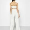 NA-KD X ZALANDO EXCLUSIVE SOFT RIBBED PANTS - Pantalon Classique - Offwhite -NA-KD Soldes Magasin 845561b0b2ed4f029a5902bbbbb46f87