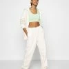 NA-KD X ZALANDO EXCLUSIVE - LOOSE FIT PANTS - Pantalon De Survêtement - Off-white 9 NA-KD X ZALANDO EXCLUSIVE - LOOSE FIT PANTS - Pantalon De Survêtement - Off-white -NA-KD Soldes Magasin cf446e7e73ca40bda03da64bcb936c87