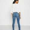 NA-KD HIGH WAIST RAW HEM - Jeans Skinny - Mid Blue -NA-KD Soldes Magasin d8103f01055d4bc2b1fdb711e863b58a