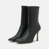 NA-KD HALF MOON BOOTS - Bottines - Black -NA-KD Soldes Magasin ebf7b66f183b4d8d8f735eaf905baadf